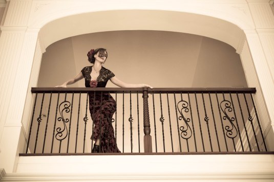 Woman in Balcony by Sharon Birke www.PowerfulGoddess.com